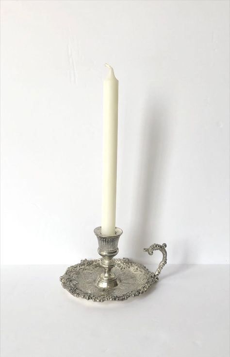 This sterling silver chamberstick is absolutely stunning. It is in great vintage condition with stunning patina. The ornate design makes this sterling silver candlestick holder look so classy. (Does not come with the white candlestick pictured) Vintage, Design, Antiques, Ornate, Silver, Sterling, Taper Candle, Sterling Silver, Silver Candle