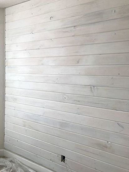 I love the rustic tone it sets for the rest of the room. Home, Shiplap Fireplace, Tongue And Groove Walls, White Shiplap Wall, Faux Shiplap, Brick Fireplace Makeover, Faux Wood Wall, Wood Plank Walls, White Wood Paneling