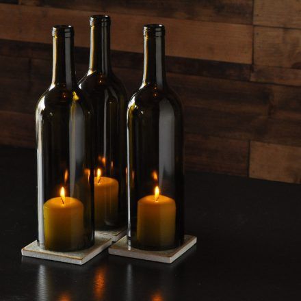 The Wine Bottle Candle Centerpiece with colored glass tiles will give an instant boost to the aesthetics of your living space or business environmentThis gorgeous fixture features three wine bottle candle lights that spell sophistication through and throughThe candle centerpiece is made with olive green Cabernet-style bottles that rest upon three hand-painted glass tiles. These candle lights make a perfect addition to a barrestaurantor dining room spaceYou can also incorporate them into the dec Decoration, Wine Bottle Candle Holder, Wine Bottle Candle Centerpiece, Wine Bottle Lamp, Bottle Candle Holder, Wine Bottle Decor, Wine Bottle Candles, Wine Bottle Centerpieces, Wine Glass Centerpieces