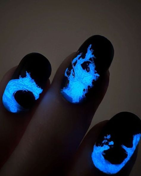 Caitlin V. on Instagram: "Bioluminescent wave nails!!! The perfect time for glow in the dark polish! Have you ever seen a bioluminescent wave?? I have seen some faint ones and it was so incredible. The videos of dolphins swimming through it are straight magic. Hopefully I get a chance to see some really bright ones someday! For now, I’ll just look at my nails. (Check out my tutorial reel!) A crazy coincidence happened yesterday. Right after I finished these nails, I went on Instagram and saw th