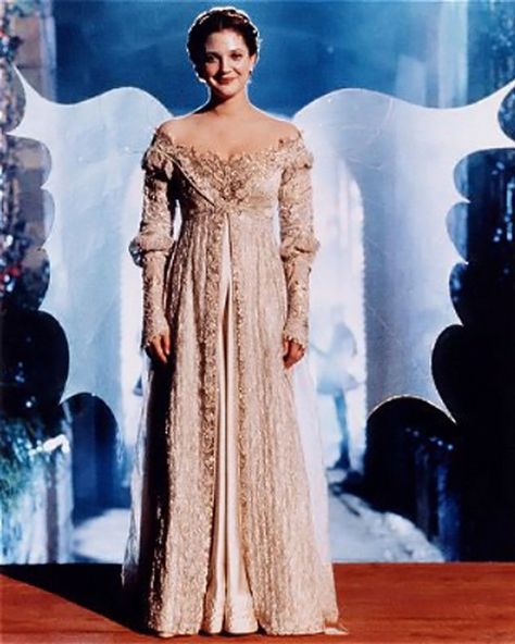 When Danielle (aka Cinderella, aka Drew Barrymore in the 1998 movie) walked into the ball wearing the same gorgeous gown her mother wore down the aisle, she looked like an angel—and not just because of the wings. Often referred to as the "Breathe" gown because of the phrase the character whispers as she enters the ballroom, it boasted a beaded bodice, off-the-shoulder neckline, and seriously intricate long sleeves, and was accessorized, of course, with "glass" slippers by Salvatore Ferragamo... Disney, Costumes, Bollywood, Haute Couture, Robe, Costume, Hochzeit, Dress, Vestidos