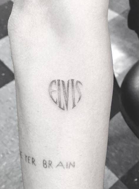 Single needle "Elvis" heart tattoo on Miley Cyrus' right forearm. Tattoo Artist: Dr. Woo Tattoo, Tattoo Designs, Tattoo Quotes, Tattoos, Elvis Presley, Finger Tattoos, Michael Jackson Tattoo, Elvis Tattoo, Future Tattoos