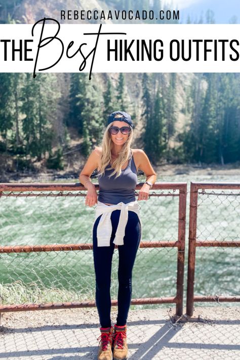 A blonde woman is leaning against a chain fence with a stream and trees behind her in Yellowstone National Park. She is wearing a hiking outfit consisting of a backwards hat, tank top, sweatshirt wrapped around her waist, black leggings and hiking boots. Fitness, Camping, Fitness Outfits, Best Hiking Clothes For Women, Hiking Clothes Women, Camping Outfits For Women Summer, Hiking Clothes, Womens Hiking Outfits, Camping Outfits For Women