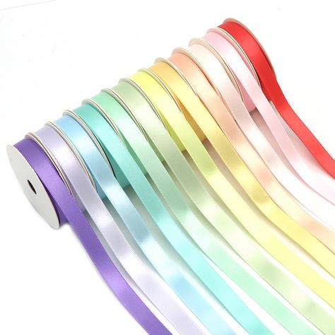 Purchase the Gwen Studios 3/8" x 3yd. Satin Ribbon, 12ct. at Michaels. com. The Pastel Ribbon Pack has 36 Yards of Satin Ribbon on 3 Yard Spools. Perfect for Crafts, Gift Wrap, Hair Bows, Decorations and more! This colorful assortment of Single Faced Satin Ribbon includes solid fabric ribbon in 12 pastel shades. Each color comes on handy 3-yard spool (total of 36 Yards). Gwen Studios narrow 3/8" ribbon is the perfect width for gift wrapping, crafts, mini hair bows, cake pop bows, crafts and more Pastel, Gift Wrapping, Fabric Ribbon, Ribbon Colors, Ribbon Skirts, Yellow Ribbon, Ribbon, Fabric Color, Satin Bows