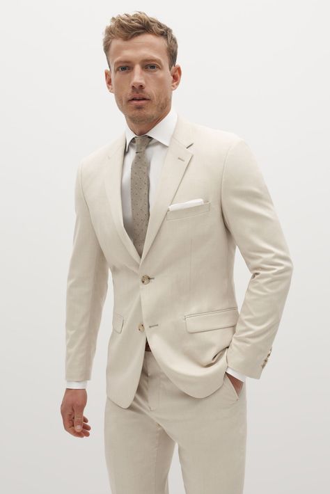 Play into the neutral-hued trend with this light tan suit, which feels especially perfect for early fall nuptials. It’s made of a stretchy fabric meant to keep you comfortable for hours, and the light color is sure to pair well with almost any wedding-day color palette. Groomsmen, Suits, Tan Suit Wedding, Tan Suit Jacket, Groomsmen Suits, Mens Suits, Men’s Suits, Suit Jacket, Tan Suit