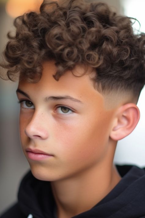 For boys with curly hair, a taper fade paired with twisted curls offers a stylish appearance. The taper fade emphasizes the curls on top, creating a contrast. Click here to check out more best teenage boy haircuts this year. Toddler Boys Haircut Longer Curly, Boys Curly Haircuts Kids, Mixed Boy Haircut Curly Hair, Boy Hair Cuts, Boys Haircuts Curly Hair, Boys Curly Haircuts, Mixed Boys Haircuts, Boy Haircuts, Boy Haircuts Long