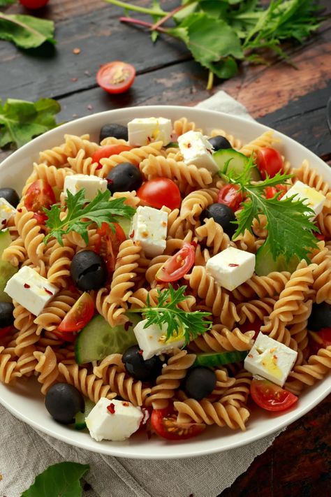 Ina Garten's pasta salad is a hearty, refreshing dish that'll quickly make any meal special. Loaded with tomatoes, feta, and olives, it's tasty all year. Pasta, Pasta Salad, Fitness, Ina Garten, Salad Recipes, Salads, Feta Pasta Salad, Pasta Salad Recipes, Ina Garten Pasta Salad