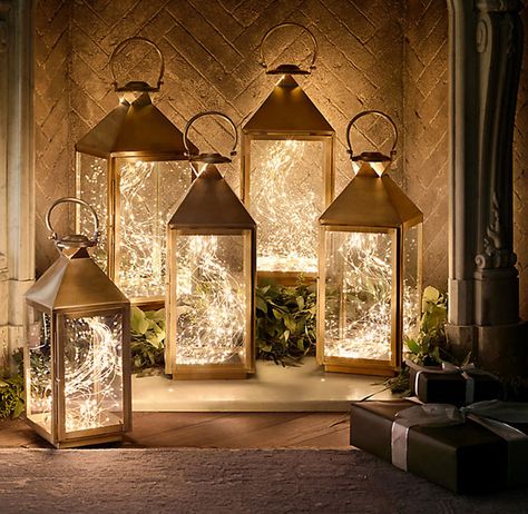 Magical, Festive Fairy Lights For Your Winter Wedding Decor ~ Restoration Hardware fairy lights inside of lanterns placed inside fireplace