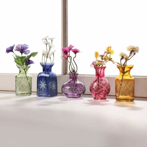 A set of five mini vases because artfully displaying flowers with five small vases is much better than using one big one. 25 Things That Will Add A Personal Touch To Your Home Upcycling, Diy, Home Décor, Cut Glass, Small Glass Vases, Vase Set, Vases, Bottles Decoration, Bud Vases