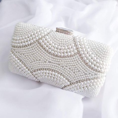 Pearl Beaded Bridal Clutch - A beautiful clutch lasts longer than just your wedding day. You're the bride, indulge in a fashionable clutch you love. You'll love the functionality of carrying some special things with you on your big day, plus it makes for great photos and a memorable piece to hold on to for years to come. Fashionable clutches for the bride from expert garter designer, The Garter Girl.  #gartergirl #thegartergirl #gartergirlloves #bridalclutches #engaged Handbags, Moda, Hochzeit, Party Dress, Bridal Handbags, Vestidos De Novia, Bridal Accessories, Fashion Bags, Bride Bag