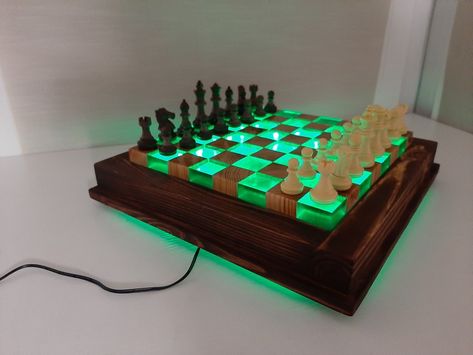 In this video we show how to make a Chess from Wood and Epoxy Resin with a floating effect and light. This chess is completely handcrafted with a minimum set of tools in the color mahogany. Wood burning. DIY. If you enjoy this video, Please Subscribe and share. We are appreciate all of the support. Woodworking, Pokémon, Diy, Pyrography, Chess Board, Resin Table, Wood Burning, Wood Working, Wooden Projects