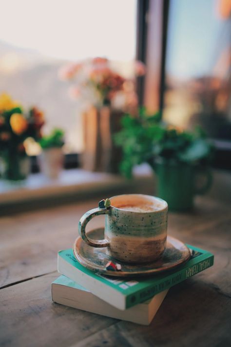 Cup of Coffee on Stack of Books by Window · Free Stock Photo Mugs, Tea, Instagram, Coffee Pictures, Tea And Books, Coffee Love, Coffee And Books, Aesthetic Coffee, Coffee Photography