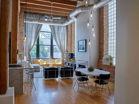 Spacious and dreamy timber loft apartment in the West Loop neighborhood of Chicago with exposed brick, exposed duct work, hardwood floors, drop industrial lighting, and glass block window | Domu Chicago Apartments Home Décor, Home, Décor, Chicago, House, Spacious, Decor, Modern Contemporary, House Layouts