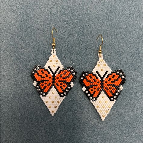 Handcrafted Beaded Butterfly And Triangular Earrings Made With Glass Delica Beads And 18 K Gold Earring Hooks. 3 Inches Long 2 Inches Wide. Pattern By Handmadeinua. Bead Earrings, Bead Jewellery, Beaded Earrings Patterns, Seed Bead Earrings, Beaded Earrings Tutorials, Beaded Earrings, Butterfly Beaded Earrings, Earring Hooks, Seed Bead Jewelry