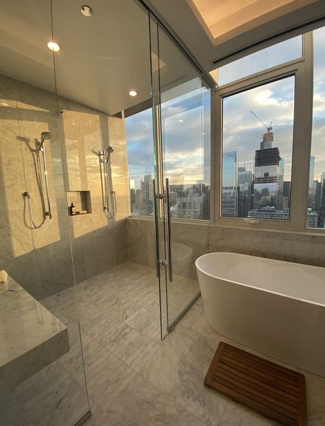 Perfect does not even begin to describe this bathroom! Throwback to our tour at one of the most beautiful penthouses in Chicago! 

Locate a luxury apartment with AptAmigo, a team of professional apartment locators. Enjoy natural light with floor-to-ceiling windows. AptAmigo has the ultimate list of the best luxury apartments with floor-to-ceiling windows in Chicago. Penthouse Bathroom Luxury, Bathroom With Window, Penthouse Bathroom, Luxury Bathroom, Penthouse Apartment Bathroom, Luxury Condo Interior, Luxury Penthouse Apartment Floor Plans, Apartment Luxury Penthouses, Luxurious Penthouse