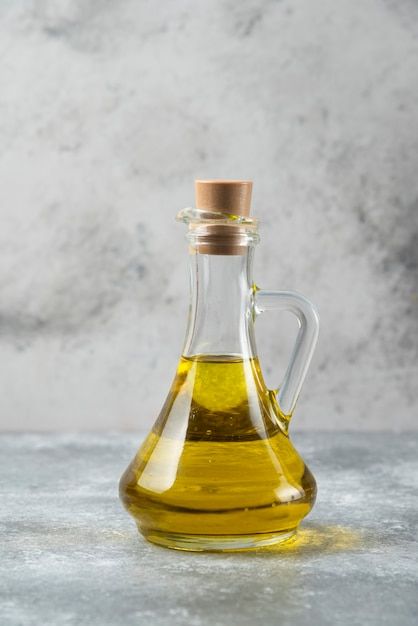 Olive oil bottle on marble table. | Free Photo #Freepik #freephoto #cooking-oil #oil-bottle #olive-oil #oil Art, Ayurveda, Ceramics, Oil Bottle, Olive Oil Bottles, Glass Bottles, Bottle, Artisan Oil, Oil Substitute