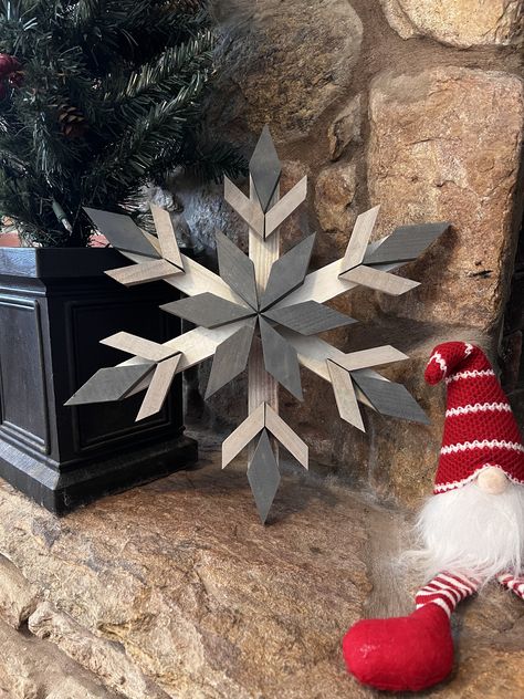 Welcome to our enchanting Etsy store, where each handcrafted cedar wooden snowflake, measuring approximately 16 inches, tells a unique story in wood. Explore the beauty of intricate designs and timeless craftsmanship that capture the magic of winter. Adorn your space with these one-of-a-kind pieces, bringing a touch of nature's elegance into your home. Made by a veteran in Lancaster, Pennsylvania *Cedar is rot and pest-resistant Christmas Decorations, Wood Projects, Wood Crafts, Wood, Wood Snowflake, Wooden Snowflakes, Barn Quilt, Barn Quilt Designs, Christmas Projects