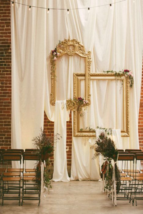 Create this enviable ceremony backdrop with draped fabric, large gold frames  flowers. Source: Sarah Maren Photography. #ceremonysite #goldframes Wedding Decorations, Wedding Deco, Ceremony Decorations, Wedding Ceremony Backdrop Indoor, Wedding Arch, Ceremony Backdrop, Wedding Ceremony Backdrop, Indoor Wedding Ceremonies, Ceremony