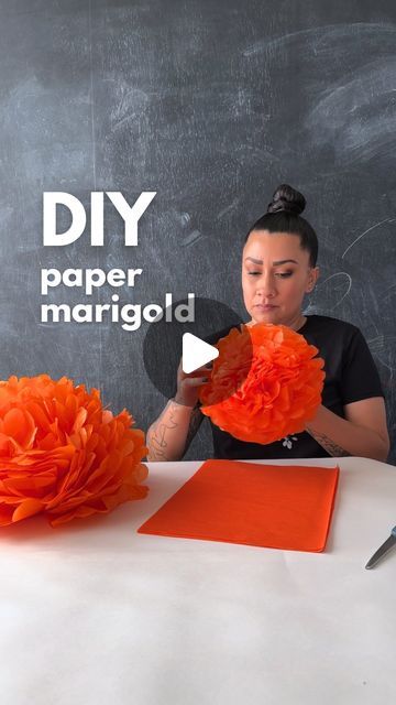 Monica Chavez | DIY | Latina on Instagram: "DIY Giant Paper Marigolds The paper flowers are super easy to make and a fun activity for all ages. I’m using them this year for my Dia de Muertos ofrenda. Supplies: - Orange or Yellow tissue paper - Scissors - Floral wire or pipe cleaner - (Optional) paper plate + wall mounting putty The following tissue paper size gives these finished flower sizes: 7” x 10” tissue = 9" flower 14” x 20” tissue = 14" flower 20” x 28” tissue = 17" flower Feel free to get creative with the sizes! I recommend a thick high quality tissue paper so that they hold up to use year after year." Tissue Paper Crafts, Tissue Paper Flowers, Diy, Making Tissue Paper Flowers, Tissue Paper Flowers Giant, Tissue Paper Centerpieces, Tissue Paper Flowers Easy, Tissue Paper Decorations, Tissue Paper Flowers Diy