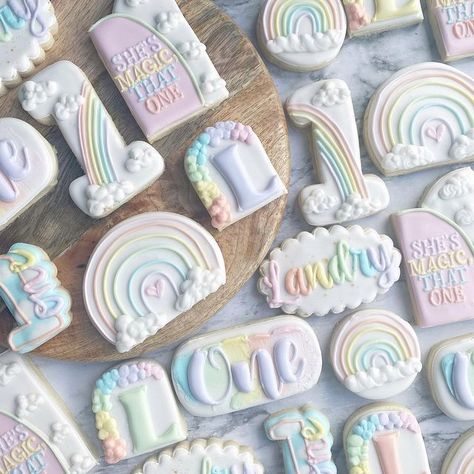 Erica on Instagram: "All the sweet rainbow designs for miracle baby, Landry, on her first birthday! #rainbowcookies #rainbowbabycookies #rainbowbirthday #rainbowbirthdaycookies #firstbirthday #firstbirthdayparty #firstbirthdaycookies #decoratedcookies #royalicingcookies #ohiocookier #ohiobakery #ohiocookies #mamamungaibakes" Birthday Cookies, Biscuits, Pasta, Instagram, Rainbow Baby Birthday, Rainbow Baby Birthday Party, First Birthday Cookies, Baby Birthday Party, Rainbow Birthday Party