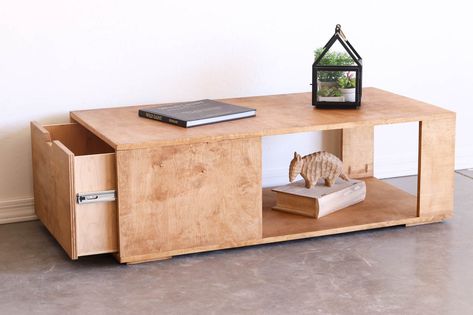 Learn how to build a modern coffee table with storage for under $100. The large drawer holds blankets, games, or whatever you like. Sofas, Diy, Home Décor, Outdoor, Diy Furniture, Diy Storage, Diy Furniture Projects, Furniture Projects, Modern Storage