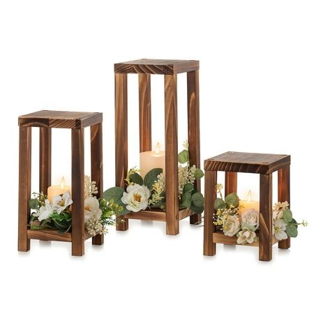 At Nuptio, everything is about weddings. Nuptio decorative candle lanterns are a blank canvas, you can dress them up exactly how you'd like them. These centerpieces can be used as a candle holder, frame for a vase of flowers or filled with any desired decorations and have the farmhouse look. Not too big that they take over your decor, this decorative lantern for home decor is the perfect size to place on fireplace or table. Size: S+M+L.  Color: Brown. Wooden Candle Lanterns, Wooden Candle Holders, Lantern Candle Holders, Wood Candle Holders, Rustic Candle Holders, Candle Lanterns, Lantern Candle Decor, Wooden Lanterns, Candle Holder Decor
