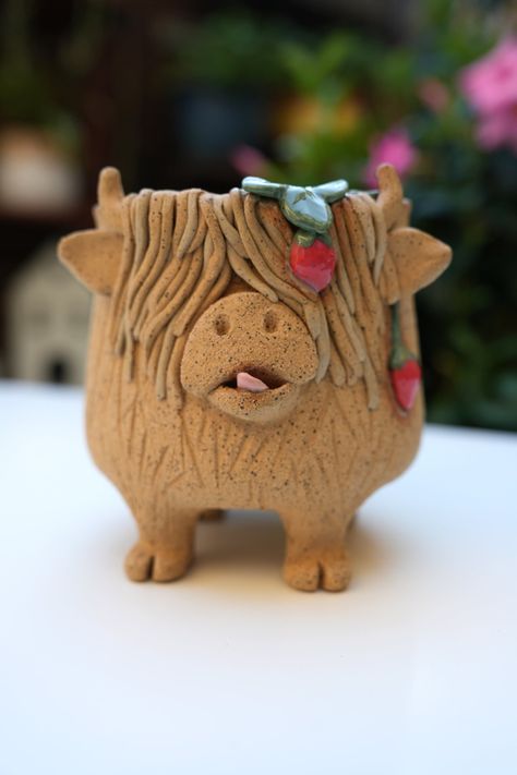 Highland cow Phenelope, enjoying ripe strawberries. Caramel speckled clay, fresh pink glaze inside. Approx. 20 oz capacity. Food safe; can be used as bowl, planter, or vase as well. Microwave safe; dishwasher top shelf. Please note, I make this cutie to order. Ceramic process can take up to 8 weeks because of sculpting time, drying time, kiln firing availability, and my current order load. Please  take a look at quoted delivery time, as this is approximately when I will be able to finish this fo Pottery, Ceramic Pottery, Tattoo, Elephant Pottery, Pottery Animals, Pottery Mugs, Pottery Pots, Ceramic Animals, Pottery Crafts