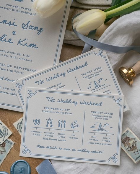 M+E’s precious invitations for their French coastal wedding featuring a letterpress print, custom venue illustration printed on vellum, and handdrawn illustrations of the couple and weekend timeline activities. We love how the antique label holder and baby blue satin ribbon tie all the elements together for a whimsical, one of a kind finish. 💙🛥️ . . . . . . . . #luxuryweddingstationery #luxuryweddinginvitations #customweddingstationery #customweddingdesign #classicwedding #minimalwedding #ele... Save The Weekend Wedding Invitations, Coastal Wedding Invitation Suite, Wedding Invites Timeline, Wedding Invite Timeline, Save The Date Ribbon, Wedding Weekend Timeline, Coastal Wedding Invites, Coastal Wedding Invitation, Classic Coastal Wedding