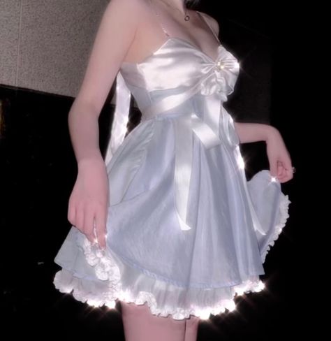 A short silk dress. The dress has a light blue skirt and a white bow-shaped top. A grainy and glittery filter has been placed over the image Outfits, Mode Wanita, Angel Outfit, Angelcore Outfit, Angel Core Outfit, Angelcore Outfits, Angel Dress Aesthetic, Pretty Outfits, Angel Dress