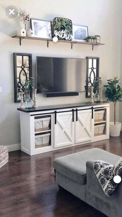 40 TV Stand Decor Ideas to Elevate Your Living Room; Here are ways you can decorate your TV stand to make watching TV that much more enjoyable! Home Décor, Shelf Above Tv, Above Tv Decor Living Rooms, Decor Above Tv Living Rooms, Above Tv Decor, Above Tv Wall Decor Living Room, Living Room Storage, Decor Above Tv, Tv Shelf Ideas