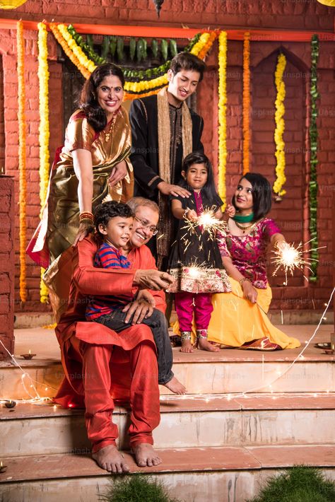 Indian Family celebrating Diwali festival with fire crackers photo – Photography Image on Unsplash Indiana, Diwali, Indian, People, Festival Guide, Indian Festivals, Indian Family, Indian People, Family Traditions