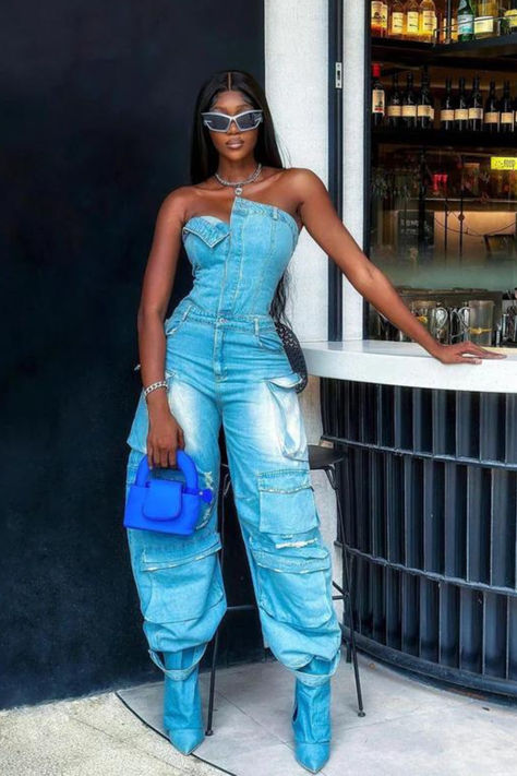 The Eden Strapless Pockect Denim Jumpsuit In Blue offers a fashion-forward look with its bandeau silhouette and slim straight leg design. The pocket detailing adds a unique touch and quality construction ensures this jumpsuit is durable and comfortable to wear. 10% OFF SITEWIDE | Use code: DSALE10