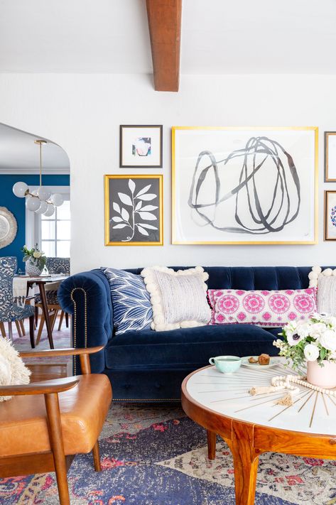 Before and After | Modern Bohemian Living Room | Featured on Apartment Therapy! From outdated to eclectic, how this 1932 English Tudor was transformed! Eclectic and bohemian design filled with bold color and texture. Navy blue velvet Chesterfield, leather accents and a gallery wall of modern art! #modernbohemiandesign #livingroomdesign #interiordesign #newyorkinteriordesign #bohodesign Paris, Design, Anthropologie, Interior, Home Décor, Anthropologie Living Room, Eclectic Living Room, Modern Eclectic Living Room, Traditional Living Room