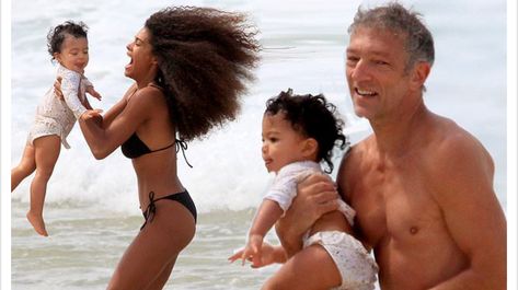 Deirdre Simonds related in the Daily Mail post: " Vincent Cassel, 53, and his wife Tina Kunakey, 23, look happier than ever as they enjoy... Celebrities, People, Tina Kunakey, Famous Kids, Vincent Cassel, Beach Day, Couples, Famous