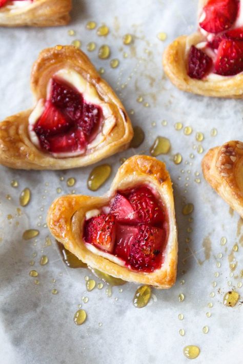 Four ingredient crispy and flaky strawberry cream cheese heart shaped puffs (or strawberry pastries) that are delicious and perfect for your valentine, giving you the perfect dessert that is so easy to make at home! #puff #pastry #puffpastry #valentines #easy #homemade #dessert #recipe #breakfast #berries #strawberries #strawberry #cheese #sweet #ideas #home #date #night #dinner #gift #quick #delicious Desserts, Pie, Snacks, Fruit, Inspiration, Pastry Dough, Strawberry Puff Pastry, Pastry Dough Recipe, Puff Pastry Desserts