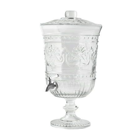The Pioneer Woman Cassie 2-Gallon Glass Dispenser offers an elegant way to display and serve beverages. Boasting a beautiful embossed design over clear glass, this drink dispenser is a perfect presentation for iced teas and sparkling punches alike. Its vintage-inspired details and sophisticated silhouette work together harmoniously to create an alluring centerpiece for your dining table or countertop while lending an authentic look and feel to your dining room or kitchen. When you're ready to se Walmart, Crafts, Pioneer Woman, Beverage Dispensers, Drink Dispenser, Gallon, Dispenser, Glass Beverage Dispenser, Pioneer