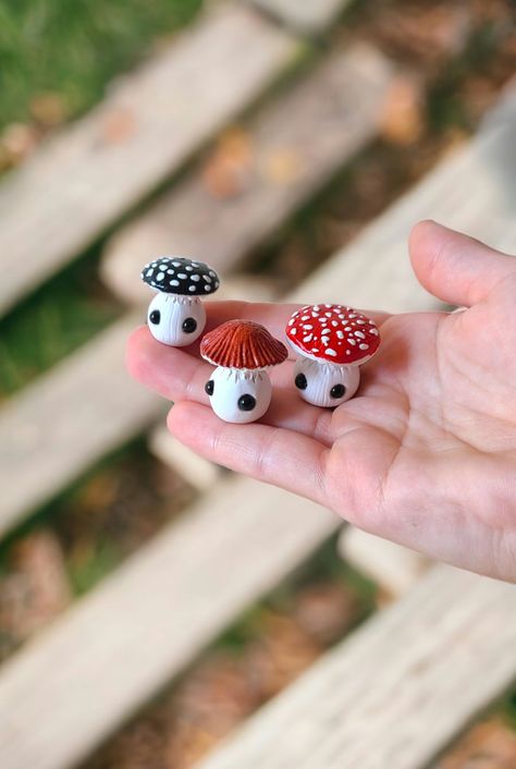Small mushroom figurines with big black eyes in the palm of a hand Fimo, Clay Crafts, Figurine, Crafts, Mushroom Crafts, Clay Figurine, Easy Clay Sculptures, Clay Figures, Clay Projects