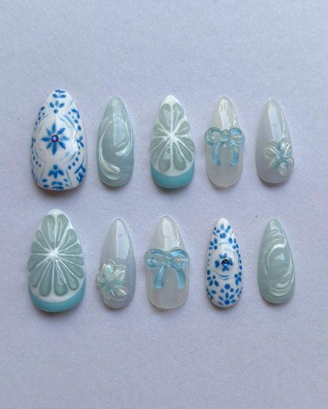a blue 1! ˚.🩵*✩｡ inspo is @amys.clients ‘s grapefruit n willow pattern design + a mix of my works ₊˚ʚ 🧊 ₊˚✧ ﾟ. | Instagram Design, Kuku, Ongles, Kawaii Nails, Cute Nails, Chic Nails, Pretty Nails, Baby Blue Nails, Hoa