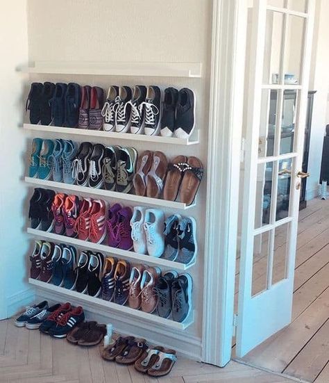 Do you keep your shoes piled in the front entryway? Do you have some on your bedroom floor, by the front door, and in the basement?  Why not orga... | 6-Try-Upright-Shelves-for-Narrow-Hallways #storage #shoestorage #shoestorageideas #shoestoragebox #shoestorageboxes #shoestorageph #shoestoragebench #shoestoragecustom #shoestoragesolutions #shoestoragecabinet #shoes #DecoratedLife Garages, Shoe Rack Organization, Shoe Storage Cupboard, Shoe Organizer Closet, Closet Shoe Storage, Shoe Organizer For Closet, Over Door Shoe Rack, Diy Shoe Rack Ideas, Door Shoe Organizer