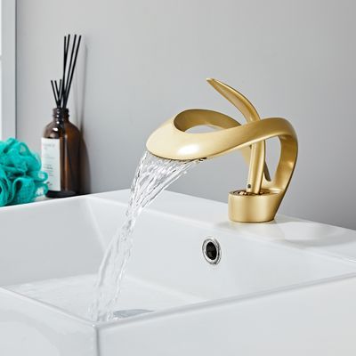 Create a modern class with the black waterfall bathroom faucet. Its wide spout is complemented by a contemporary lever handle, sure to add elegance to any bathroom. Built from lead-free solid brass composition, this faucet is a durable and attractive piece to renew your bathroom with contemporary appeal. Designed with a single handle, it is a breeze to adjust the water flow and temperature precisely.- Constructed from solid brass for durability and reliability.- Finished in high-quality, corrosi Bathroom Taps, Bathroom Faucets Waterfall, Bathroom Basin Taps, Bathroom Sink Faucets Waterfall, Vessel Sink Bathroom, Modern Bathroom Faucets, Gold Bathroom Faucet, Gold Faucet Bathroom, Bathroom Sink Faucets Modern