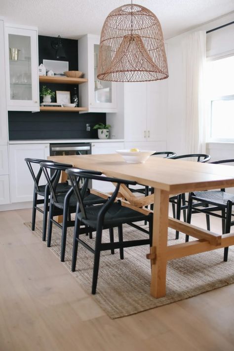 A white oak dining room table with black chairs and an oversize pendant Oak Table And Chairs, Vancouver Apartment, Black And White Dining Room, Kitchen Table Oak, Oak Dining Room Table, White Oak Table, Oak Dining Room, Dining Table Makeover, Dinning Room Tables