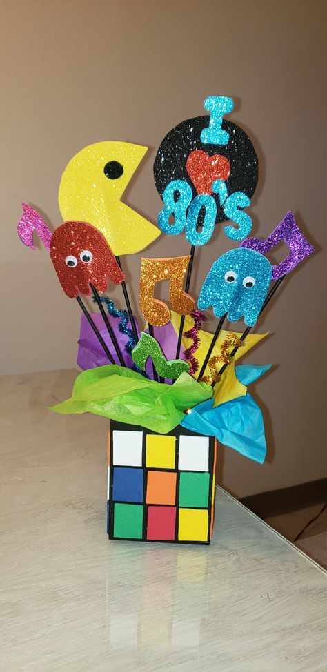 90s Theme Table Decorations, 80s Themed Table Decorations, Decades Table Decorations, 80s Party Centerpiece Ideas, 80s Music Party Decorations, Diy 80s Centerpieces, Easy 80s Party Decorations, 80s Theme Table Centerpieces, Back To The 80s Party Decor