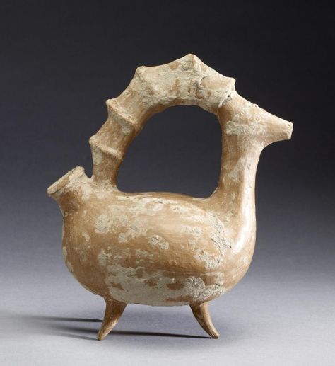 Ibex-Shaped Vessel  The ribbed horn of an ibex (a type of wild goat) forms the handle of this vessel. Made for ritual use, liquid, perhaps oil, could be poured into the tail and out of the animal's mouth.           Iranian (Artist)    ca. 1000 BC  ceramic  (Ceramics) Ceramics, Statue, Ceramic Art, Ceramic Pottery, Pottery, Ancient Pottery, Pottery Sculpture, Ceramics Pottery Art, Ceramic Vessel