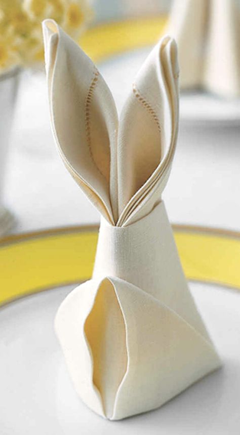 Bunny Napkin Fold ~ Easter rabbit-shaped napkins are a festive detail for the holiday table, and they only require a few simple folds. Origami, Easter Crafts, Napkin Folding, Diy Napkins, Easter Napkin Folding, Bunny Napkin Fold, Diy Easter Decorations, Easter Table, Easter Table Decorations