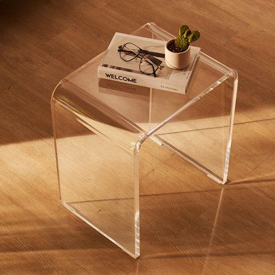 【U-Shape Acrylic Table】The U-shaped acrylic end table is made from natural acrylic material. Its transparent design exudes a crystal-clear brilliance, matching various home styles and spaces. With a 18mm thickened panel, it ensures enhanced loading capacity, providing the same stability as a wooden table. | Ivy Bronx Joram Trestle End Table, Crystal | Wayfair End Table Sets, End Tables With Storage, Glass Side Tables, End Tables, Side Table, Tall End Tables, Lucite Table, Wooden Tables, Living Room End Tables