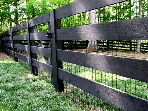 Black wire-mesh fencing is attached to four-by-four sawn board fencing. For more information and prices, see North Georgia Fencing. Outdoor, Backyard Fences, Garden Fencing, Garden Fence, Front Yard Fence, Fence Design, Fence Gate, Diy Garden Fence, Fence Construction