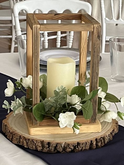 Just put together a new wooden lantern centerpiece with greens and flowers that would look fantastic adorning your wedding reception tables. 💕 #delawareweddingvenue #farmweddingde #wedding #centerpiece #candlecenterpiece #farmwedding #weddingreception Lantern Table Centerpieces, Lantern Centerpieces, Wooden Lanterns Wedding, Lanterns Wedding Reception, Lantern Decor Wedding, Lantern Centerpiece Wedding, Rustic Lantern Centerpieces, Wooden Wedding Centerpieces, Wooden Lanterns Centerpieces