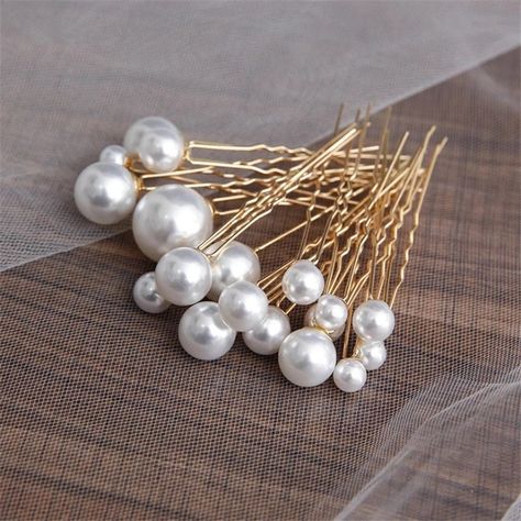 1 Set = 18 pieces made up from different zises. These gentle pearl bridal hairpins are truly stunning and would add a romantic touch to any brides' hair ensemble and bridesmaids! Made from pearls extra-large size and one set comes in total of 18 pieces. 16mm - 1 piece 14 mm - 3 pieces 12 mm - 3 pieces 10mm - 3 pieces 8 mm - 4 pieces 6mm - 4 pieces
