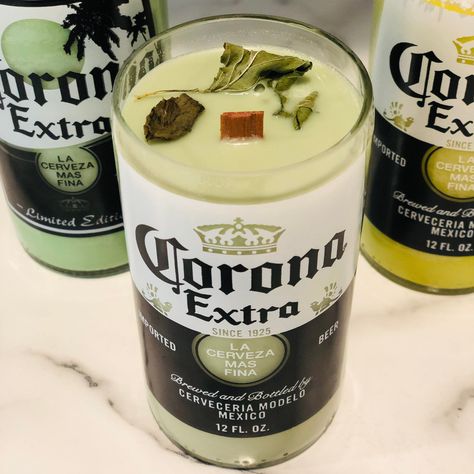 "9 oz recycled Corona beer bottle candle, hand poured to order with a soy blend. One wooden wick. Bottles have been cleaned, cut, sanded and polished. They are not sharp to touch, but please use caution as with any glass candle container. Fragrances: Beer Margarita: Sweet Lime blended with juicy Orange and tangy Tequila. Salted Rim Strawberry Margarita: Fresh Strawberries blended with Margarita. Sugared Rim Mojito: Juicy Lime, Sugar, and Mint leaves Lime Blossom Tea: A Floral Citrus blend Cherry Tequila, Beer, Beer Bottle Candles, Beer Margarita, Beer Bottle, Bottle Candles, Soy Candles, Bottle, Mojito