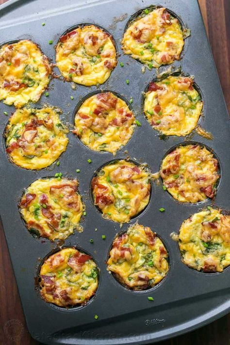 Breakfast egg muffins come together quickly. Loaded with potato, spinach, eggs, cheese and crisp bacon. Freezer friendly make-ahead breakfast muffins! #eggmuffins #breakfastmuffins #breakfast #makeaheadmeals #makeaheadbreakfast #eggmcmuffins #natashaskitchen #eggs #bacon #spinach Bacon, Quiche, Muffin, Breakfast Recipes, Brunch, Casserole Recipes, Recipes, Breakfast Casserole Muffins, Sausage Muffins